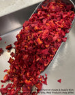 Bulk Freeze Dried Cherries in a metal scoop on a light background