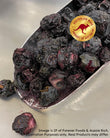 Freeze Dried Blueberries in a metal scoop with an 'Australian Made' logo on a metallic surface.