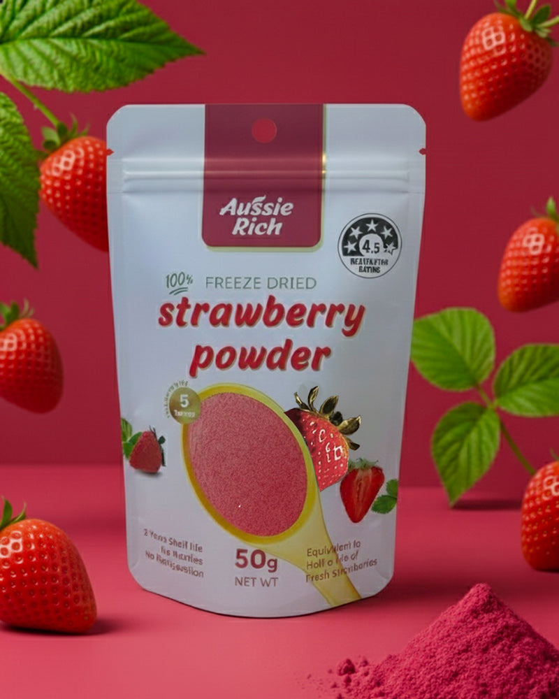 Aussie Rich freeze dried strawberry powder package with strawberries and leaves on a red background